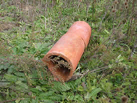 A drainage tile used to remove water from fields.