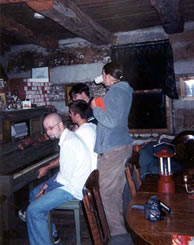 Singing and piano playing men